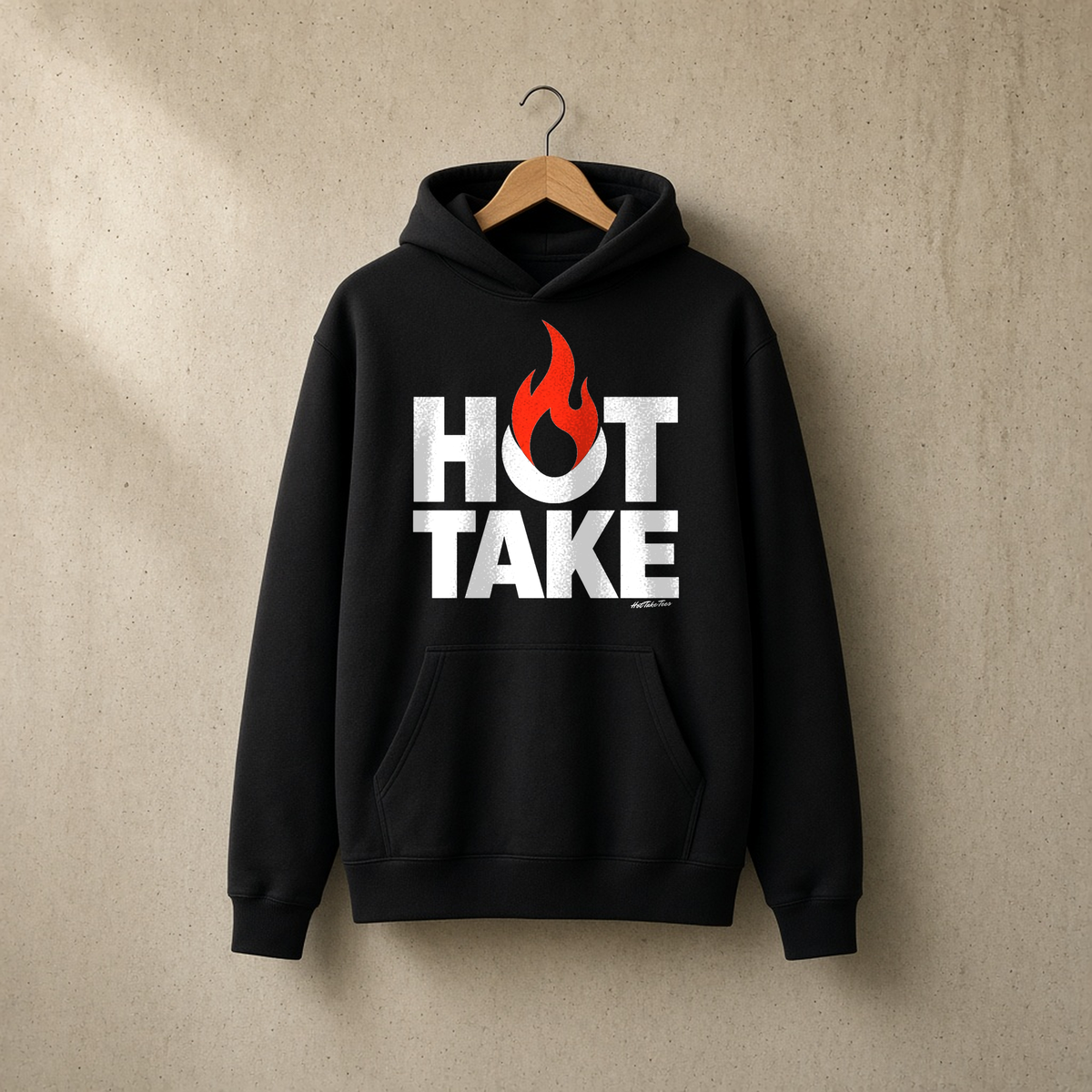 Hot Take Graphic Hoodie on a hanger